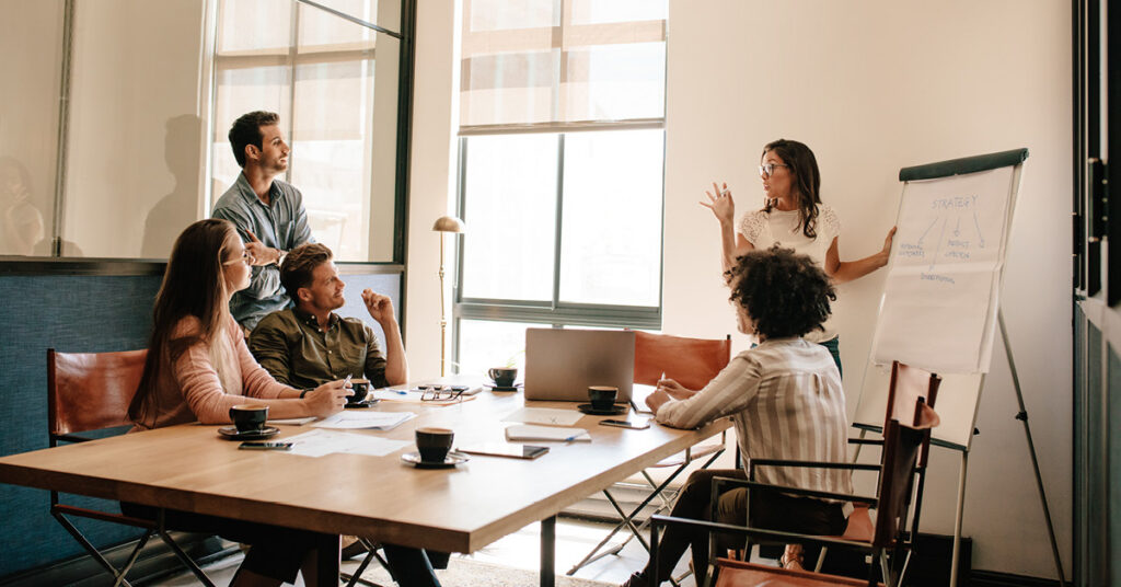 A group of coworkers meeting together