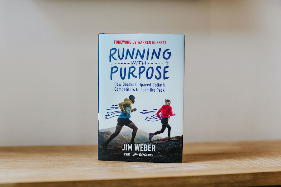 Hardcover of Running with Purpose standing on  a table