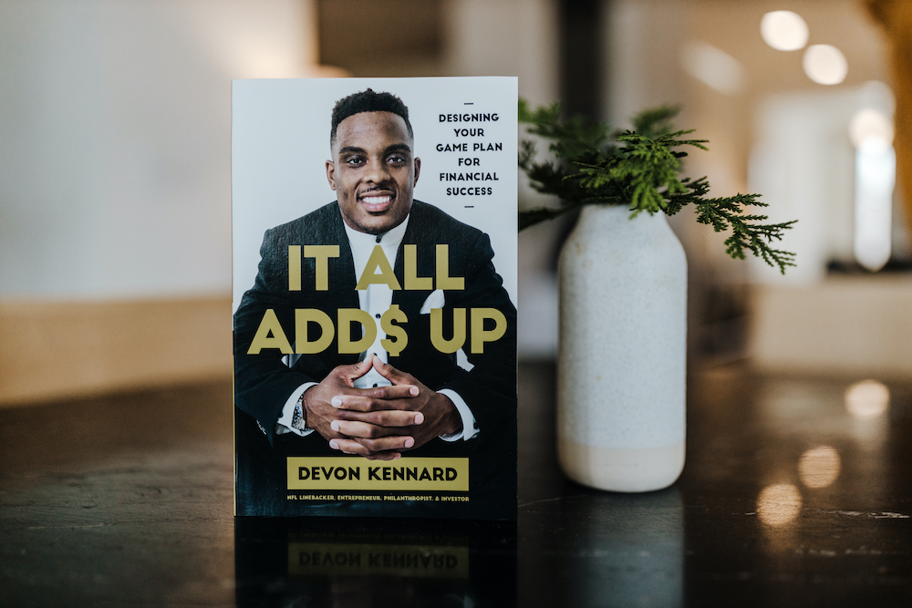 Copy of "It All Adds Up" on a table